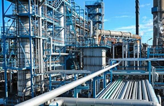 A large industrial plant with interconnected pipelines.