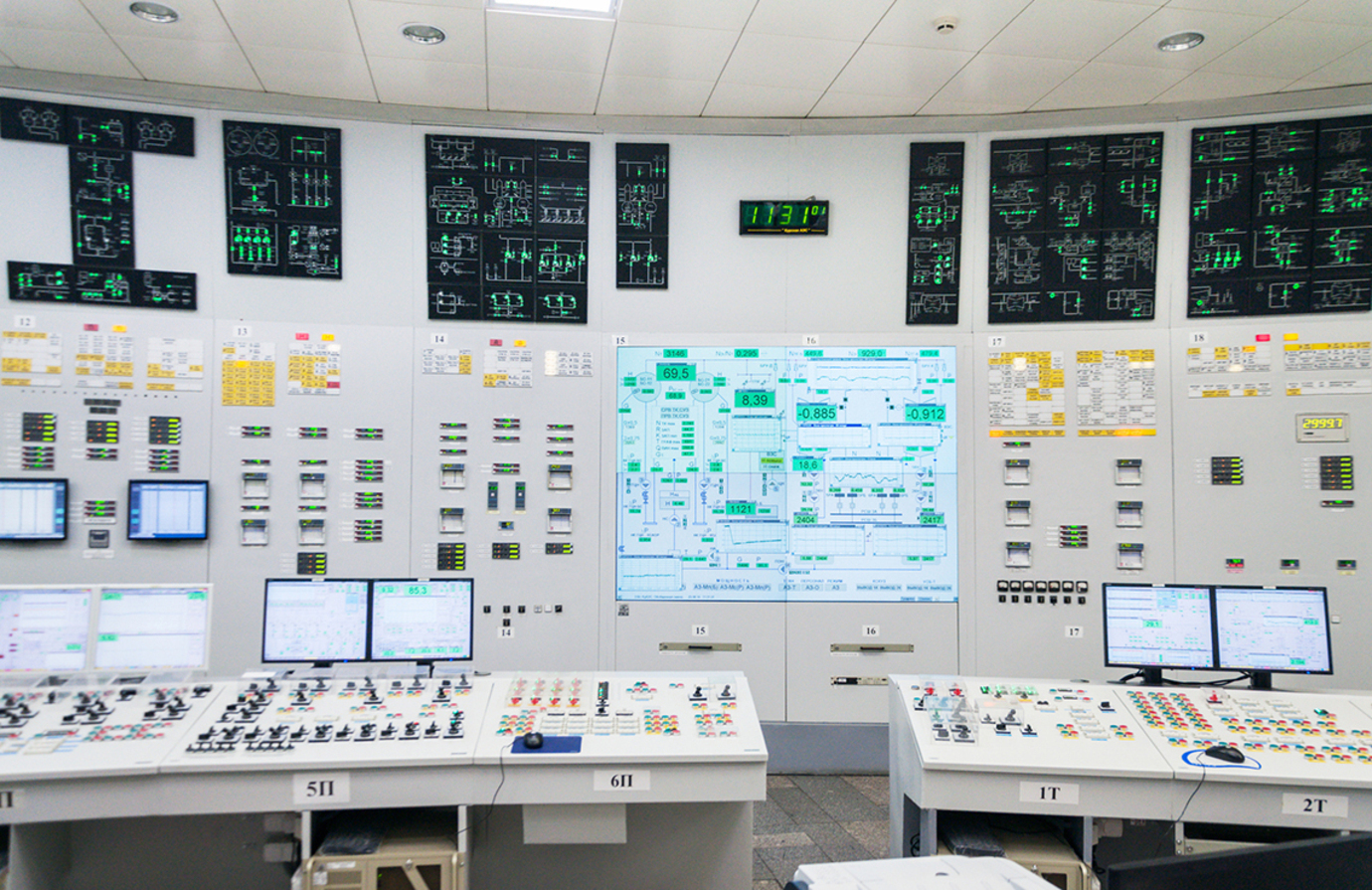 Interior shot of a nuclear power plant control room