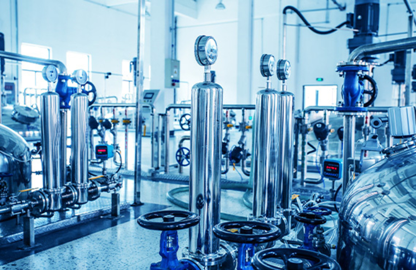 Image of a chemical manufacturing plant, representing the intersection of cybersecurity and digital transformation