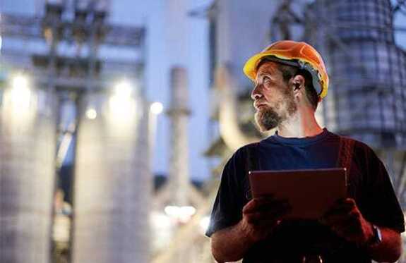 Operator tablet during nightshift for asset condition monitoring in a power plant, ensuring optimal performance and system reliability.