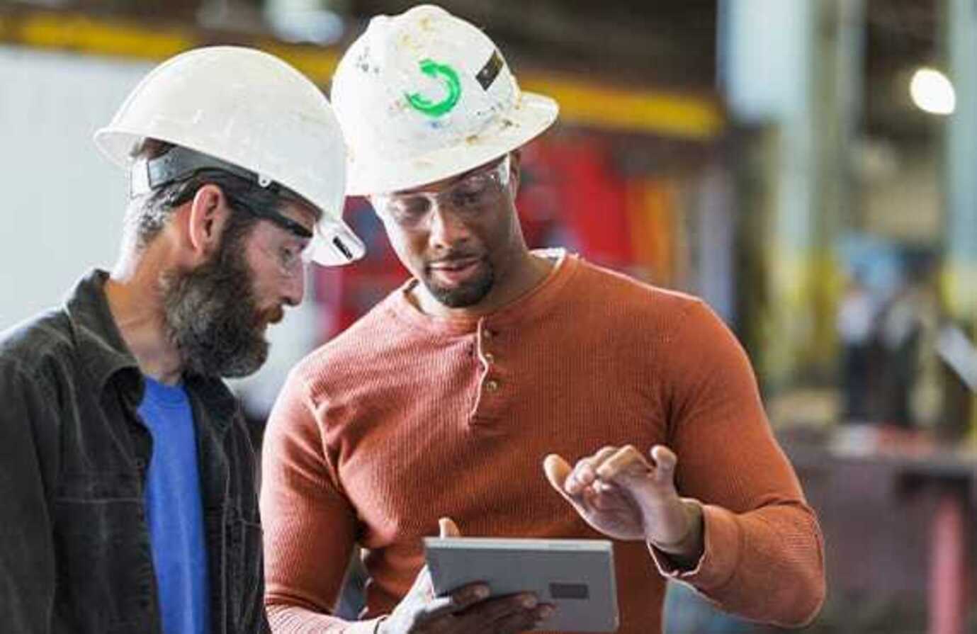 Two power generation plant using a tablet for asset reliability monitoring.