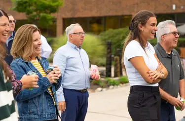 Group of Proconex employees smiling and laughing