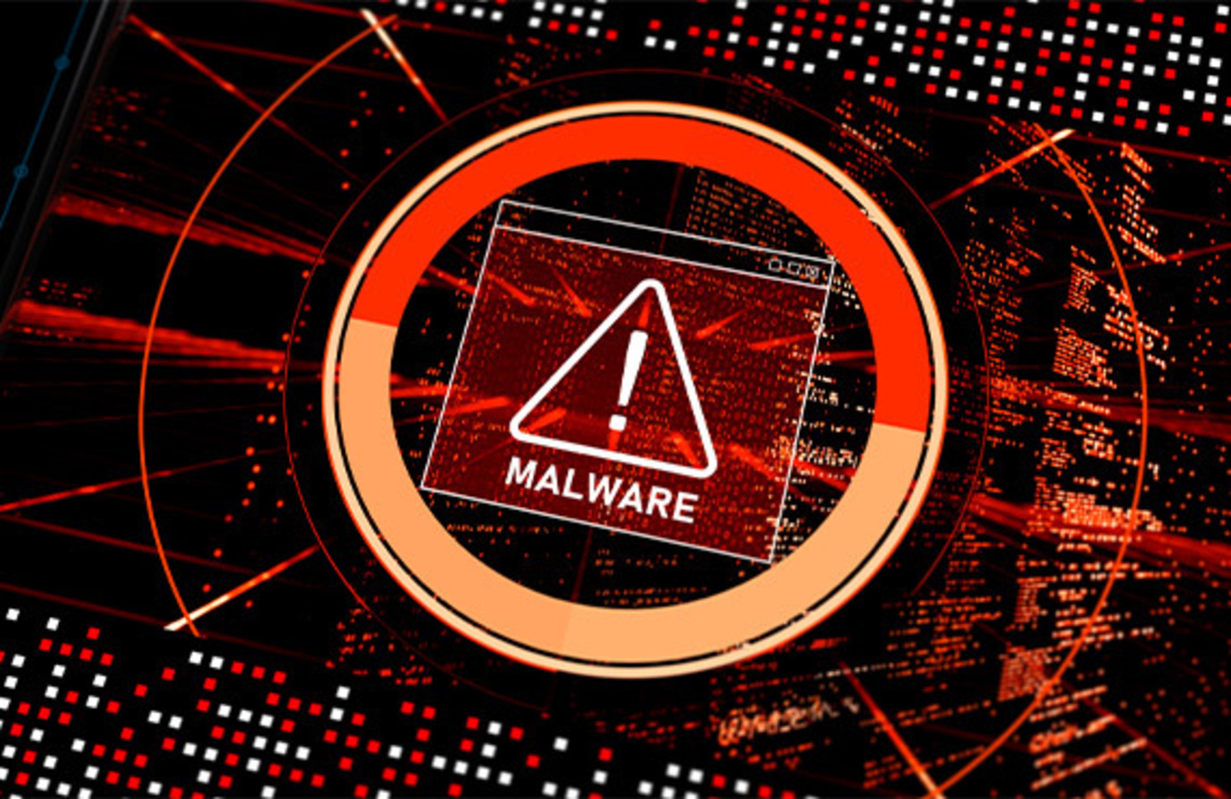 A computer screen displaying a warning sign with the word "malware" in bold red letters