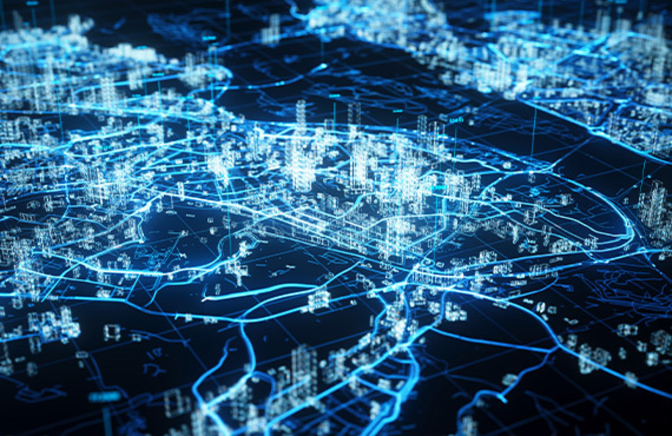 A city map with blue lights and lines representing industrial networks.