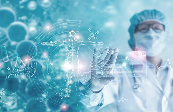 Doctor holding a tablet displaying medical symbols, symbolizing digital transformation in life sciences operations.