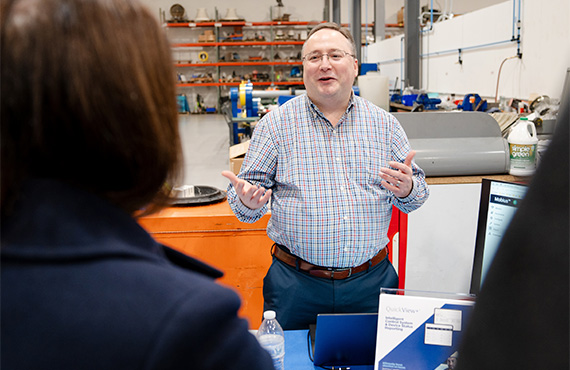 Proconex employee, Maury Bayer, reviewing cybersecurity software for industrial control systems with customers.