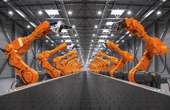 A dynamic factory scene featuring robots, highlighting the integration of IIoT asset management for enhanced productivity.