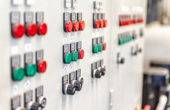 Process automation control systems panel with buttons and indicators.