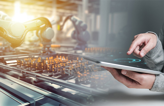 Robots collaborating in a factory setting, showcasing the integration of cybersecurity measures in manufacturing operations.
