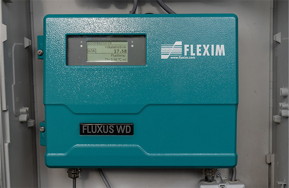 A Flexim Flexus WD Flow Meter Device installed in a facility
