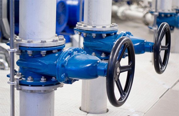 Two industrial control valves inside of a power plant