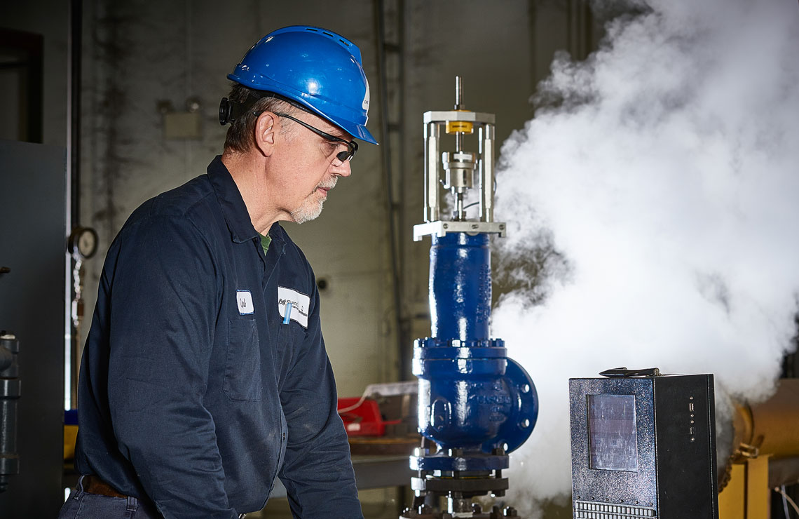 Valve technician testing a repaired pressure release valve
