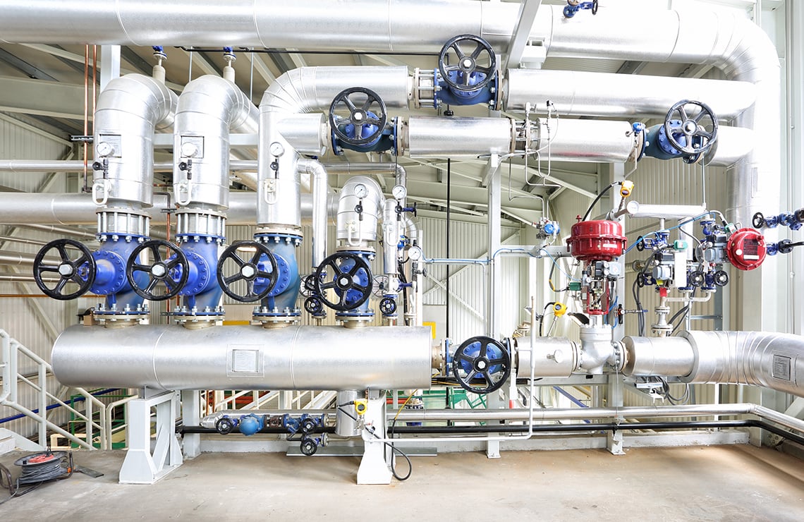 Boiler room full of flow control valves