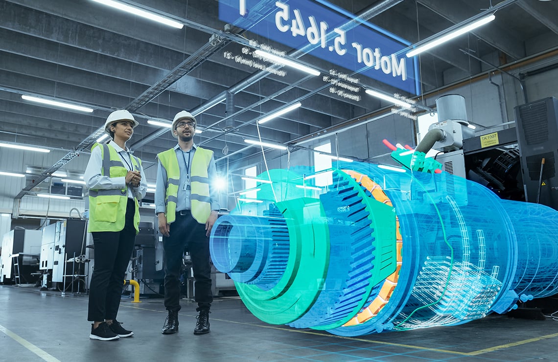 Engineers viewing a digital twin of a reactor turbine