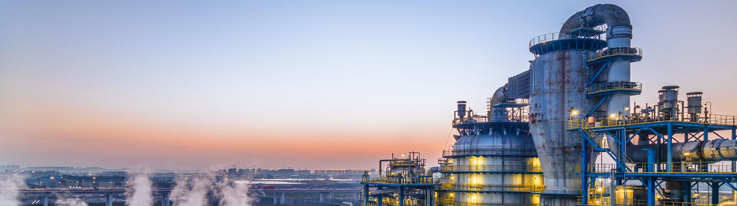Aerial view of a power generation plant during sunset